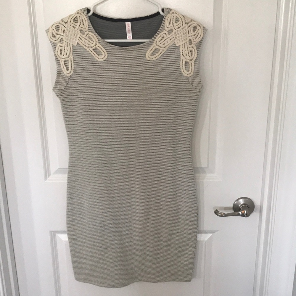 Bodycon dress with lace detailing on shoulders